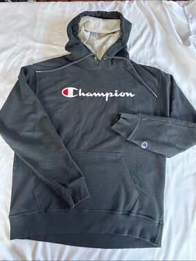 Champion Black Crewneck Hoodie with White Script Logo and Red Accent